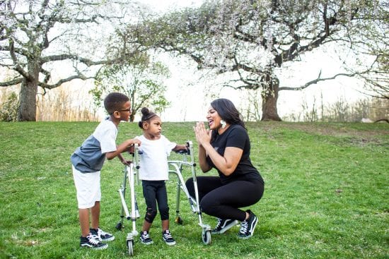 Single parent Melanie Oates with her special needs twins Julius and Genell
