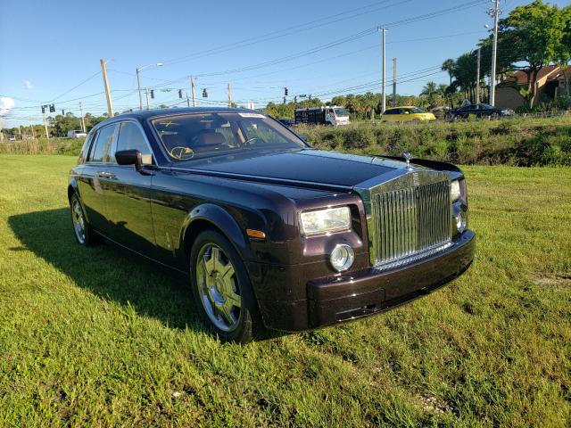 2006 burgundy Rolls-Royce Phantom donated to Kars4Kids