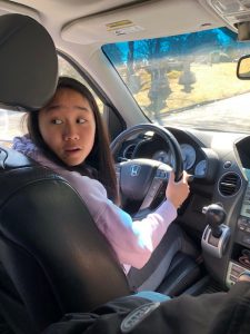 Teaching Hannah to drive in the Honda