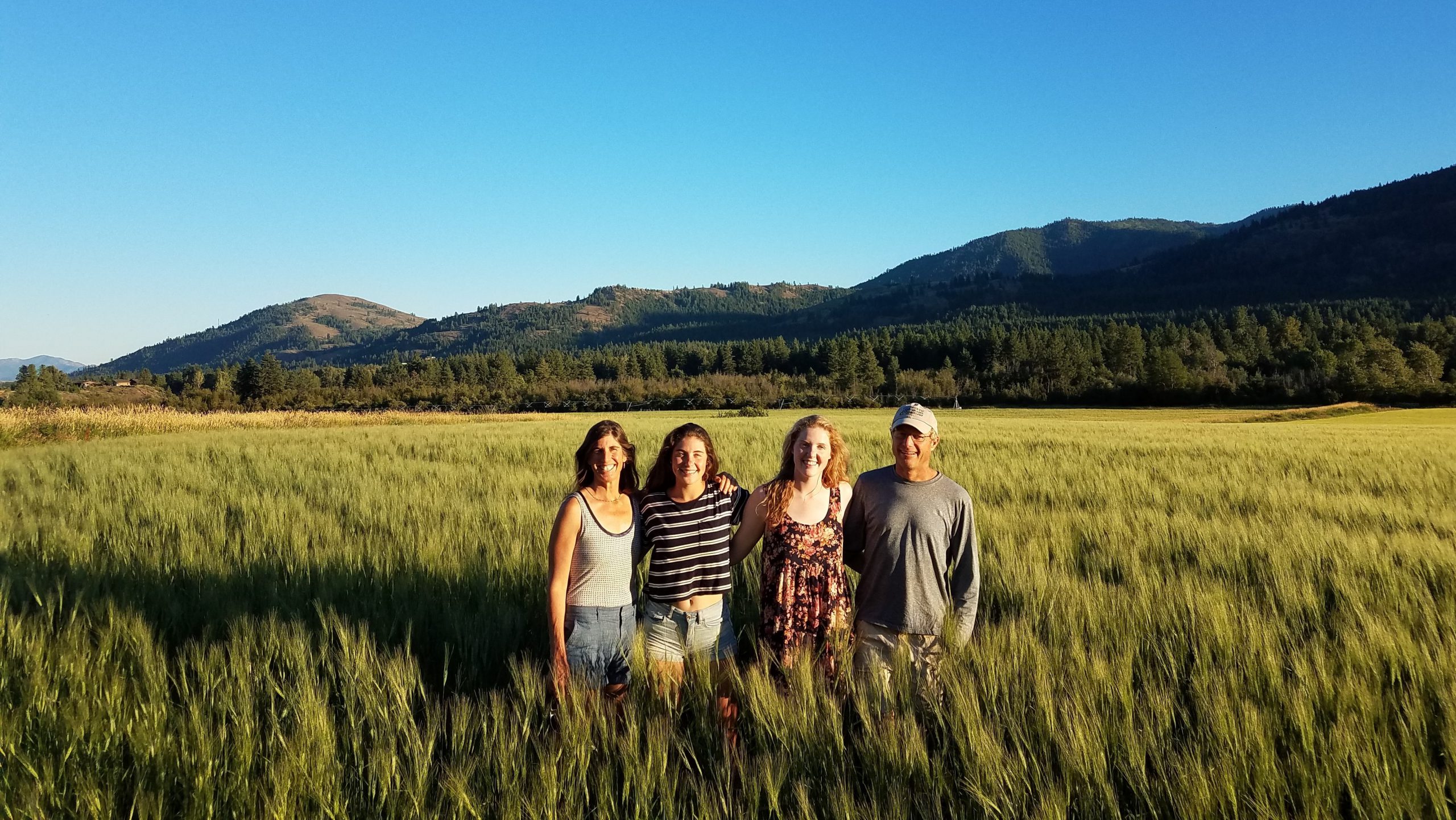 Lucy Family in emmer field Bluebird Grain Farms
