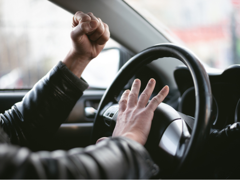 honking horn shaking fist