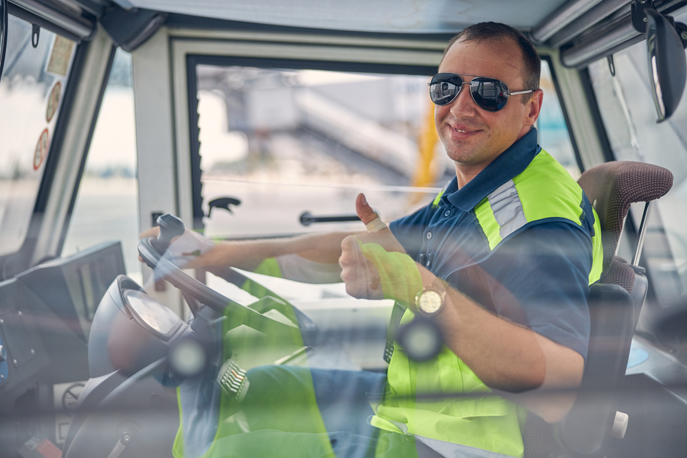 Smiling tower gives thumbs up