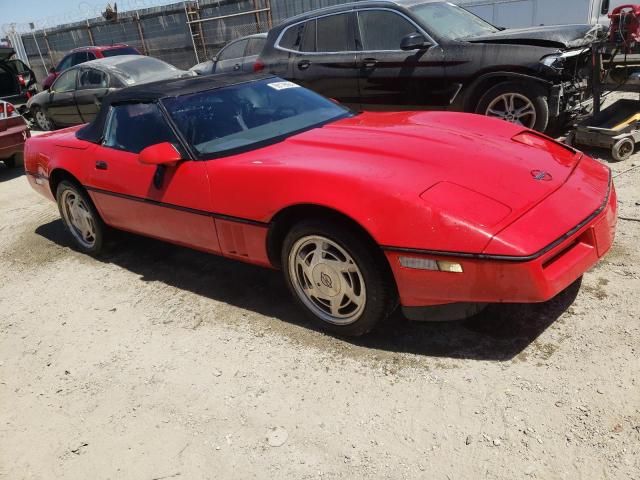 War Pony, a1989 4-door red Corvette