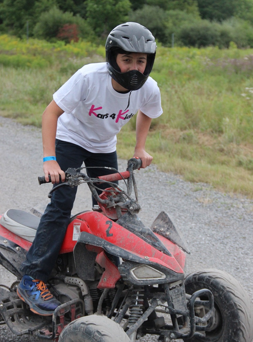 Boy at TheZone 2014 ATV riding Dave Roubeni